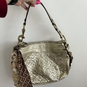 Gold coach shoulder bag with coach scarf